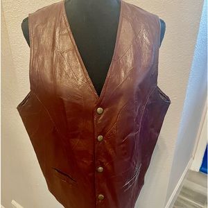 Ken's leather snap up vest Ken's patchwork, pigskin, with 2 front pockets.Size M